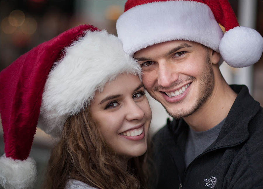 engagement photo session with Christmas Santa hats at Grants Pass