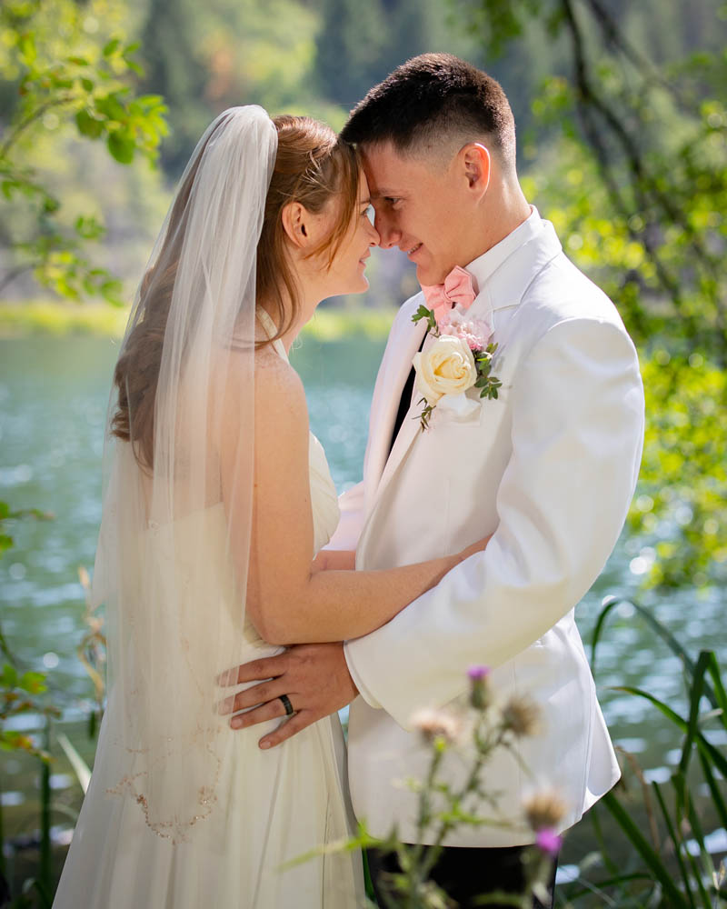 bride and groom at Oregon lake wedding
