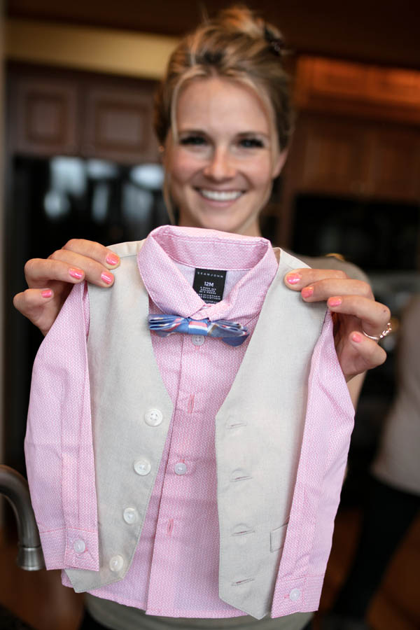 bride holding small child vest for Klamath Falls wedding at Running Y Ranch