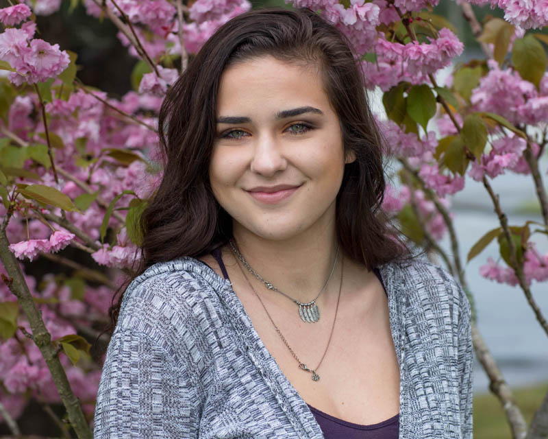 young woman and cherry tree spring flowers