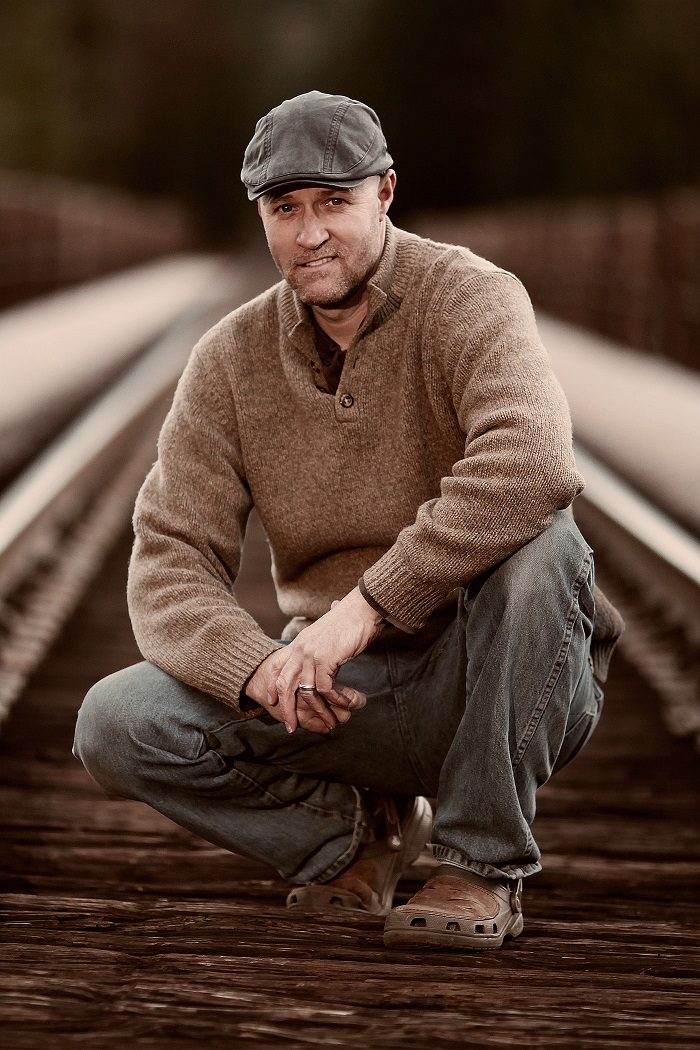 portrait of father on location Wolf Creek