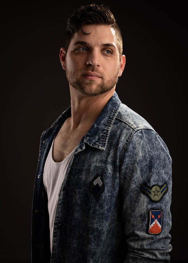 portrait of man in jean jacket by Medford photographer M D Vaden