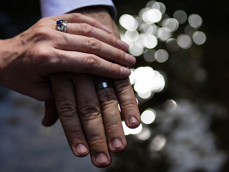 wedding rings with water light reflection