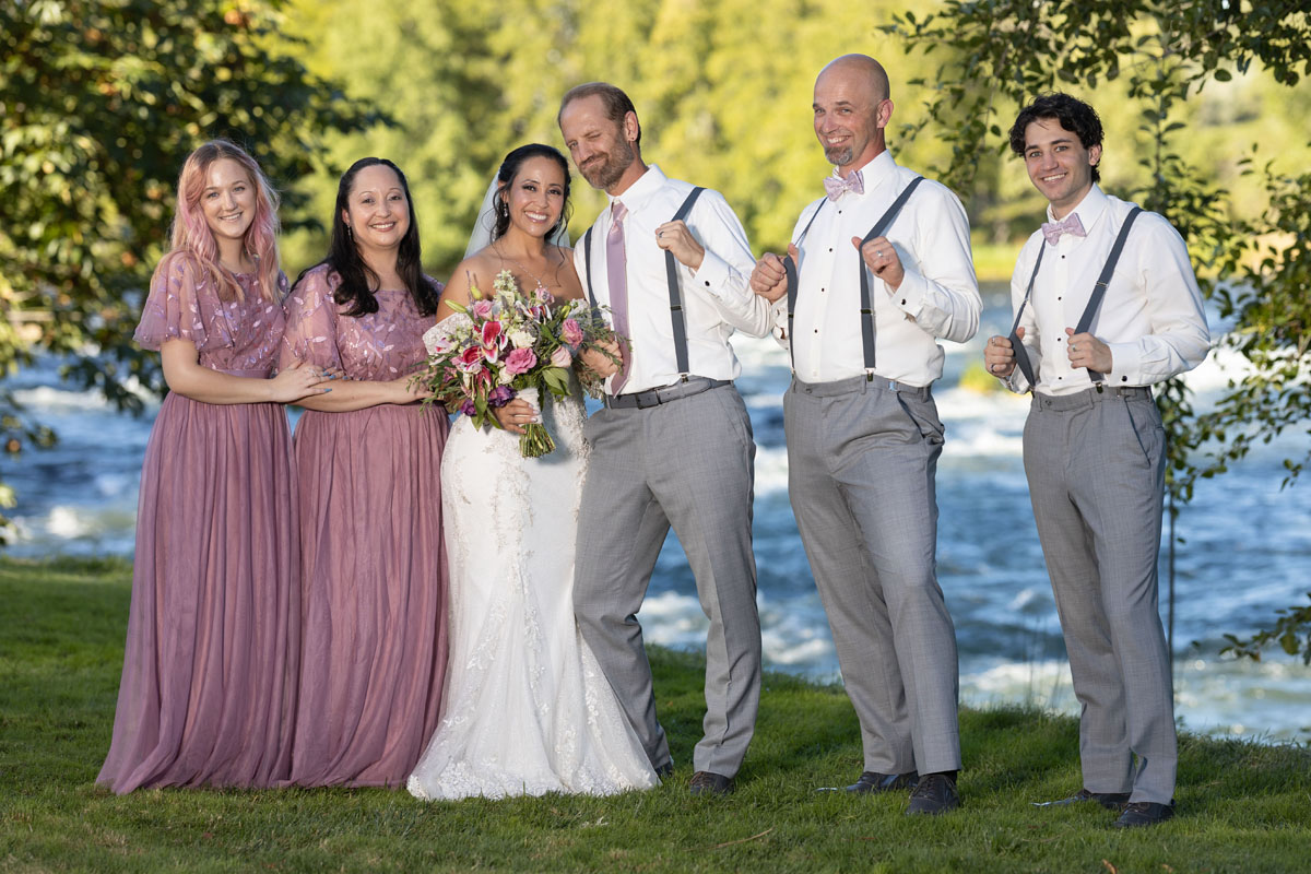 oregon groomsman and bridesmaid at barn wedding