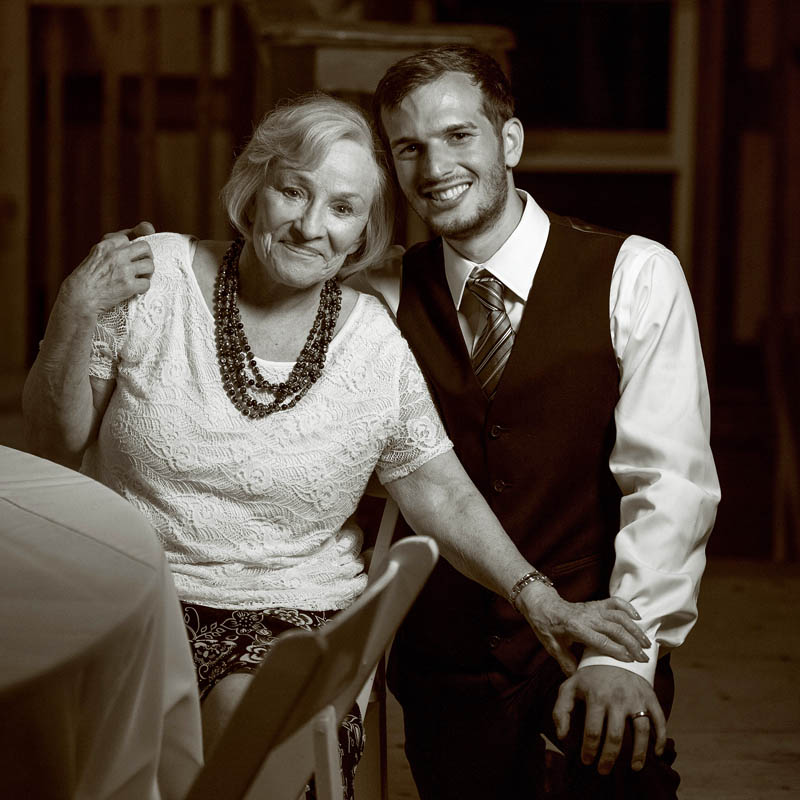 medford groom and grandmother at barn wedding reception