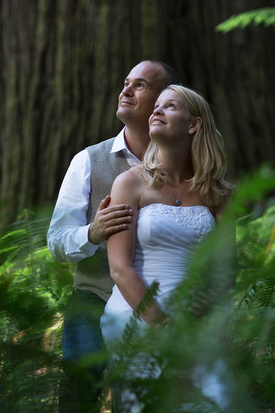 bride and groom following photographers direction