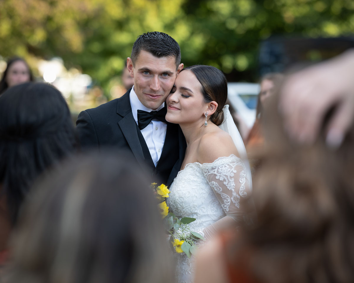 wedding couple standing in river photo by Vaden photography of Medford Oregon